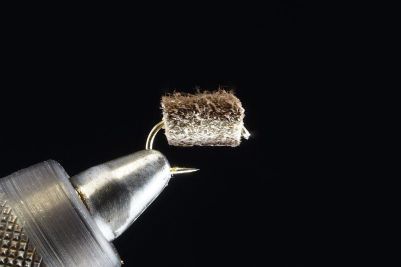 Pellet dark brown barbless no beads